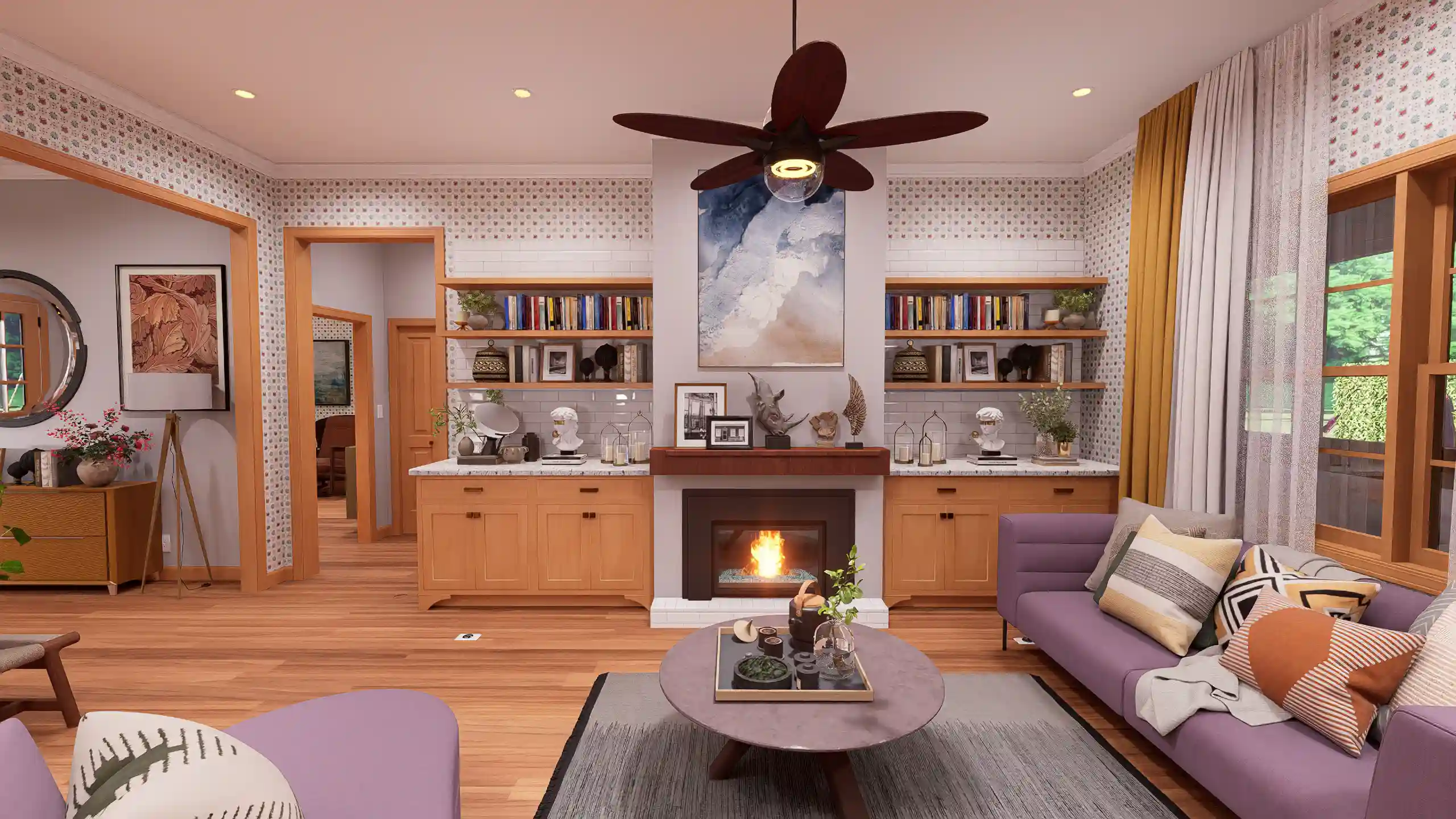 Interior of a cozy 3-bedroom cottage living area featuring modern lavender sofas, a warm glowing fireplace with a wood mantel, and light wood built-in cabinetry. The room is decorated with patterned wallpaper, mustard yellow curtains, and a large dark wood ceiling fan over hardwood floors.