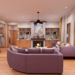 Interior of a cozy 3-bedroom cottage living area featuring modern lavender sofas, a warm glowing fireplace with a wood mantel, and light wood built-in cabinetry. The room is decorated with patterned wallpaper, mustard yellow curtains, and a large dark wood ceiling fan over hardwood floors.