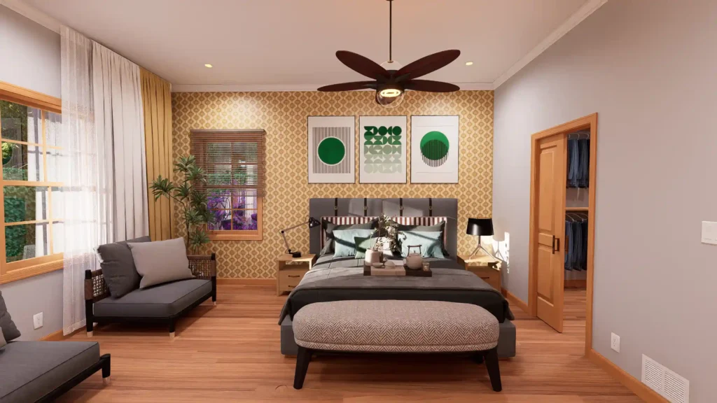 Modern cottage bedroom with patterned yellow wallpaper, green geometric wall art, a grey upholstered bed, and a small sitting area by the window