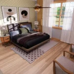 Primary bedroom in cottage house with ensuite bathroom, natural light, modern decor, wooden flooring, and cozy seating