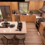 Cottage house kitchen interior with wooden cabinets, large island seating, stainless steel appliances, and natural light